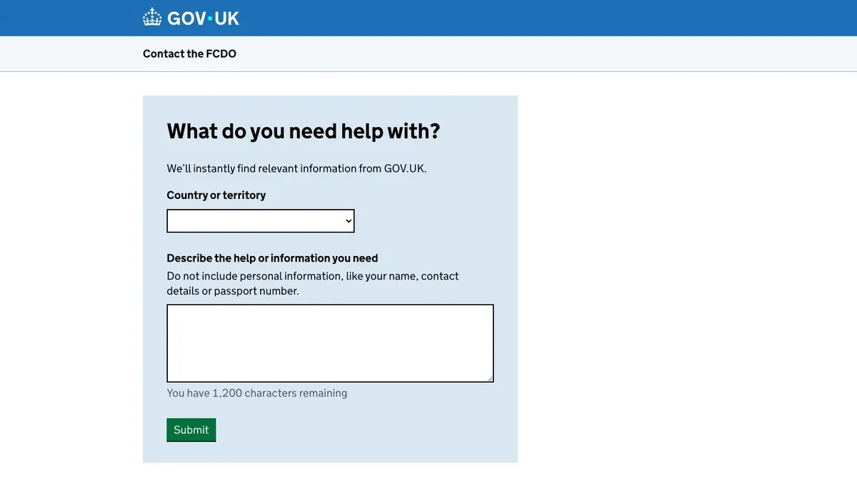 The live GOV.UK consular service asking what you need help with, with a country selector and a free-text description box.